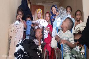 جمعية معاقي باتيس توزع ملابس العيد للأطفال من ذوي الاحتياجات الخاصة