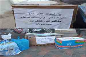 أمهات عدنيات يجهزن الكعك لأبنائهن المرابطين في جبهات القتال رغم قسوة الظروف المعيشية